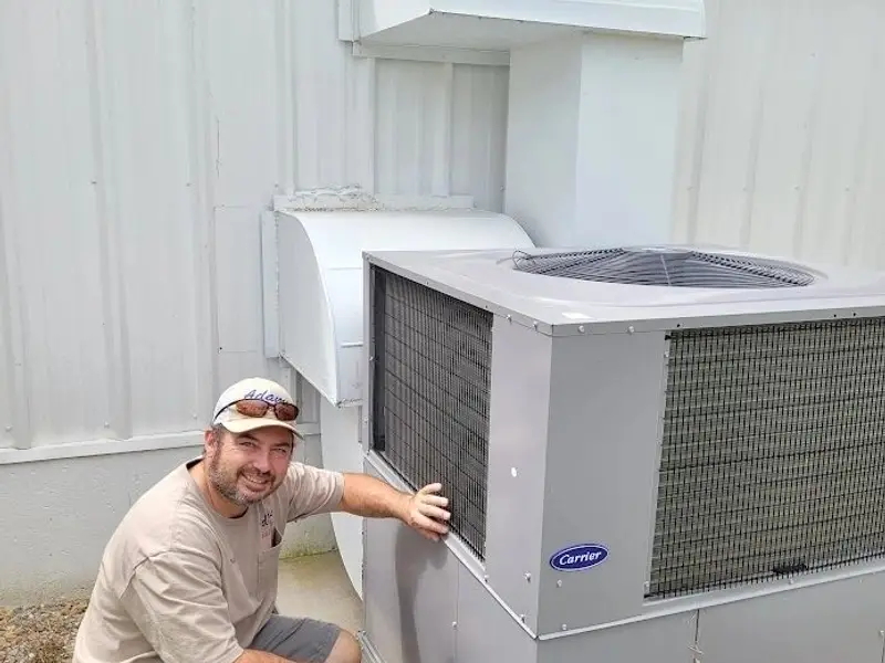 Adams technician with a new unit