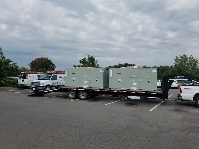 Rooftop units delivered on a trailer